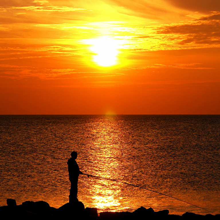 pescatore al tramonto